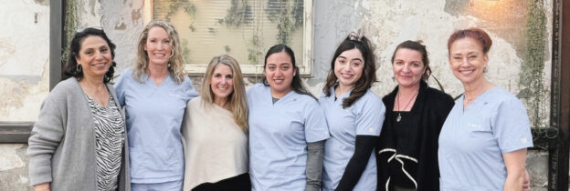 Dr. Michelle Gonzalez and her team posing together